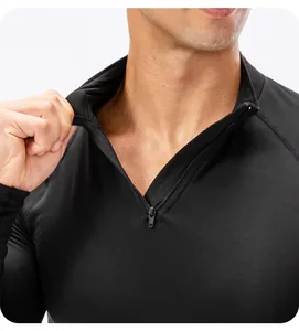 Close-up of black men's athletic zip-up sweatshirt with fleece lining texture