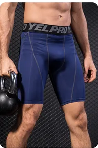 Detailweergave van de donkerblauwe compressieshort voor heren met elastische tailleband