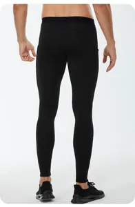 Detailed back view of men's thermal compression leggings showing slim fit and material