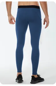 Detailed back view of men's high-elastic blue thermal compression sports leggings