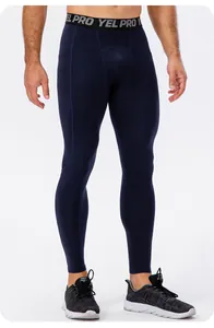 Lower body detail of men's navy blue compression training leggings for fitness.