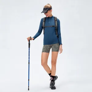 Women's blue athletic long sleeve slim fit running top with stand collar and zipper