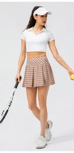 Detailed view of pink plaid pleated tennis skirt for women outdoor sports activity