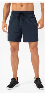 Detail shot of navy blue men's sports shorts featuring an elastic drawstring waistband.