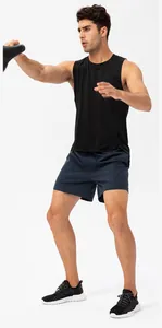 Male model wearing loose breathable quick-dry sports shorts for gym and running sessions