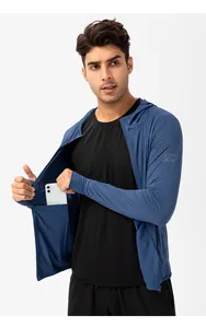 Detail of blue men's sun protection jacket showing a functional internal phone pocket