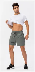 Close-up detail of men's quick-dry athletic running shorts with adjustable drawstring