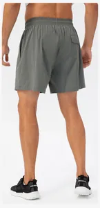Back view detail of quick-dry grey men's athletic shorts featuring an elastic waistband and pocket
