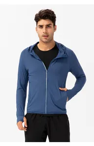 Full front view of a man wearing a blue summer sun protection hoodie with UPF50+ rating