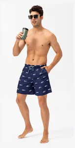 Men's quick-dry navy blue swim shorts with white fishbone pattern and elastic waist