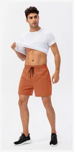 Detailed shot of men's quick-dry sports shorts featuring an elastic drawstring waist