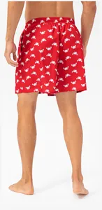 Rear view of red quick-dry beach swim trunks featuring an all-over white crab pattern