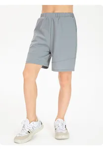 Close-up detail of children's grey quick-dry breathable loose nylon sports shorts
