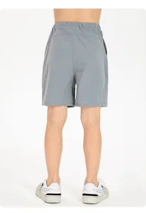 Back view of kids breathable quick-dry nylon sports shorts in light grey color design