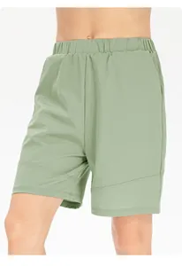 Detailed view of sage green children's breathable quick-dry sports shorts with elastic waist