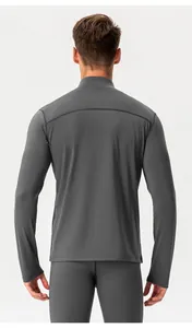 Rear view detail of men's thermal athletic top showing the fit and shoulder seams