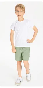 Full length detail of kids breathable quick-dry nylon sports shorts in sage green color