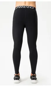 Back view detail of men's black high-elastic thermal compression leggings for fitness