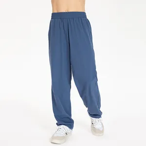 Children's loose nylon quick-dry sports pants in blue for running and fitness activities