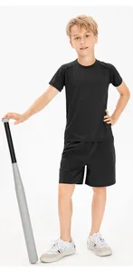 Full view of boy wearing black quick-dry sports t-shirt and shorts set with bat
