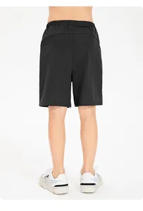 Rear view detail of children's quick-dry breathable loose-fit sports shorts in black