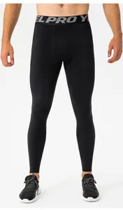 Close-up view of men's black high elasticity thermal compression leggings for fitness training