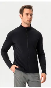 Detail of a men's black slim-fit thermal fleece sports jacket with a full-zip collar.