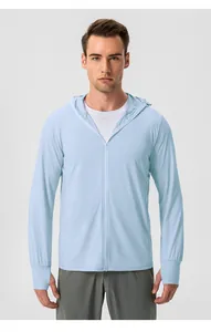Male model wearing light blue hooded sun protection jacket for outdoor sports.