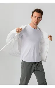 Detailed view of lightweight white sun protection jacket for outdoor cycling and hiking