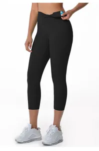 Detail of high waisted yoga capris showing hidden waistband pocket for cards