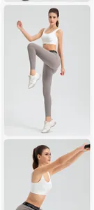 Women's high-waisted taupe yoga leggings paired with a white sports bra for fitness.