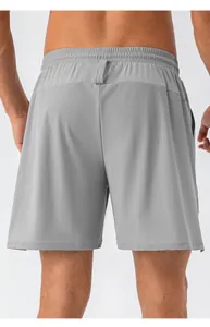 Detailed rear view of men's gray quick-dry breathable sports shorts for fitness and running