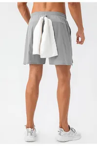 Back view of men's quick-dry athletic shorts with a functional towel loop for training