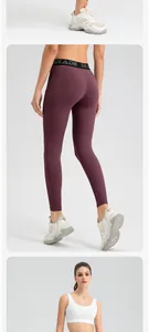 Detailed view of burgundy high-waist yoga leggings featuring a butt-lifting design