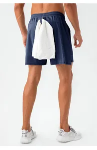 Back detail view of men's navy blue quick-dry running shorts with functional towel loop.