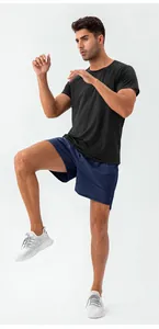 Detailed shot of men's quick-dry blue sports shorts for running and fitness training