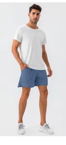 Close-up view of men's blue quick-dry athletic shorts for gym running and training