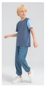 Détail de pantalon de jogging sport pour garçon à séchage rapide avec coupe ample et fluide