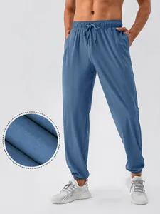 Heren Sneldrogend Koel Gevoel Nylon Sportbroek Losse Pasvorm Stretch Joggers Voor Fitness Hardlopen Outdoor Training Onderkant