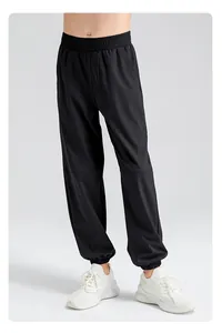Pantalon de sport noir respirant pour garçons avec taille et chevilles élastiques