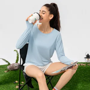 T-shirt de protection solaire bleu clair pour femme en tissu respirant UPF 50+