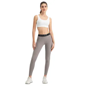 High performance women's high waist grey yoga leggings for gym and athletic fitness