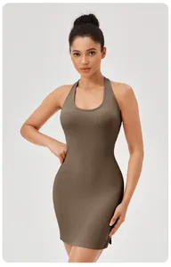 Front view detail of brown ribbed slim-fit athletic tennis dress with halter neck
