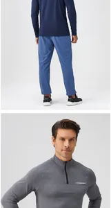 Nahaufnahme eines Herren-Sport-Sweatshirts mit halbem Reißverschluss und grauem Stehkragen