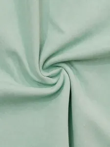 Breathable light green sports shorts fabric made of 77% nylon and 23% spandex blend