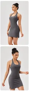 Detailed views showing the grey ribbed fabric and halter neck design of this athletic dress