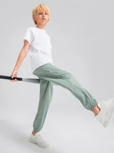 Pantalon de sport ample pour garçons, séchage rapide et tissu frais pour la course