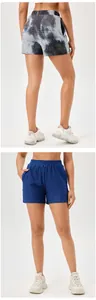 Back and front views of high-waist quick-dry sports shorts with honeycomb texture details