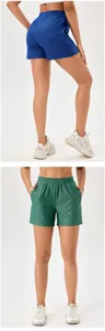 Front and back views of high-waist quick-dry sports shorts with honeycomb texture