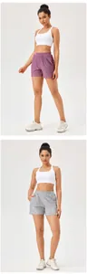 Detailed view of women's loose quick-dry sports shorts in purple and grey patterns
